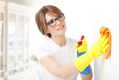 Balham cleaner performing detailed kitchen and bathroom cleaning
