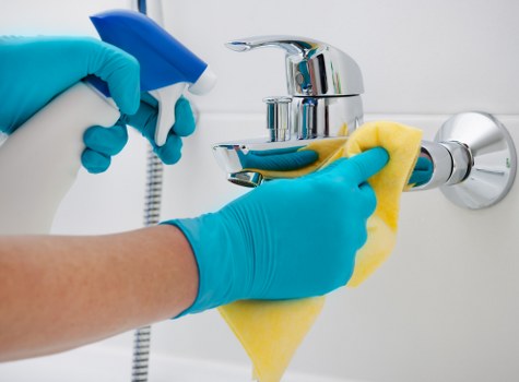 Cleaning stained walls and stone surfaces on a Balham building